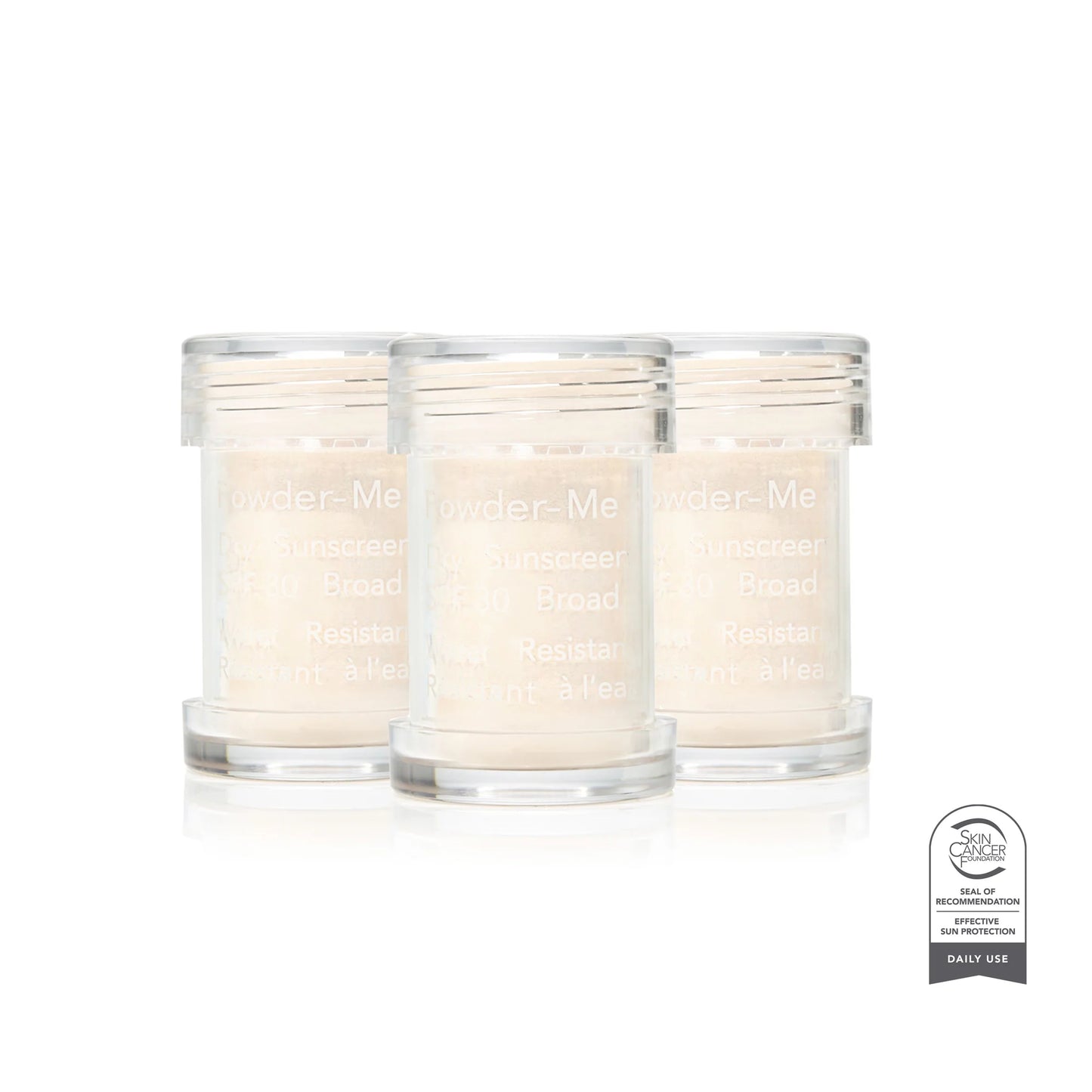 Three glass candles labeled 'Powder Me' on a white background with a certification badge.