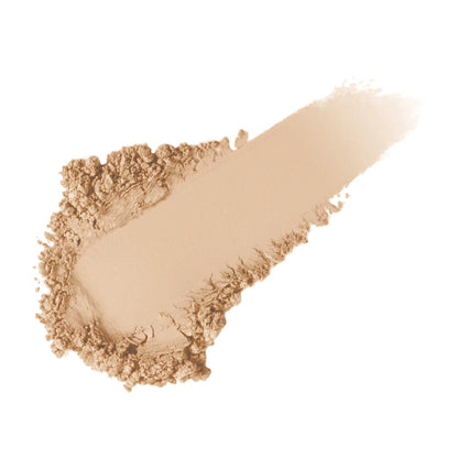 Beige makeup against a white background