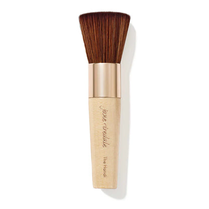 Makeup brush with wooden handle and beige shaft on a white background