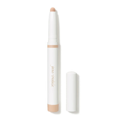 A single Jane Iredale ColorLuxe Eye Shadow Stick in the shade Alabaster, with a built-in sharpener, displayed on a white background.