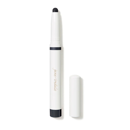 A white cream-to-powder eye shadow stick with a black cap, labeled 'Jane Iredale', next to its cap removed to show the powder inside.