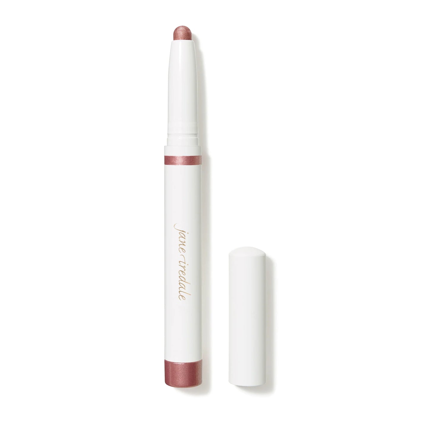 A cream-to-powder eye shadow stick in a matte pink shade, with a built-in sharpener, displayed next to its cap.