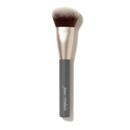 Makeup brush with black handle and beige bristles on a white background