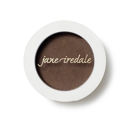 Brown eye shadow in a white compact with 'jane iredale' branding on a white background
