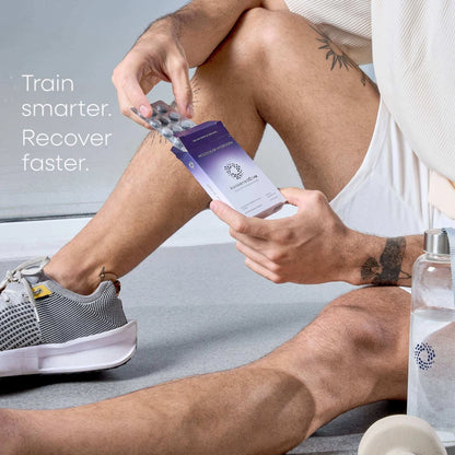 Person holding a purple container with text 'Train smarter. Recover faster.' on a light gray background