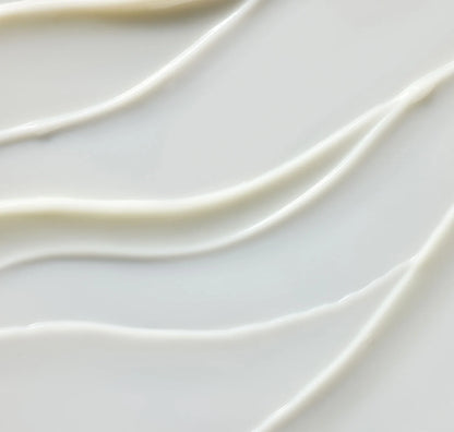 Close-up of smooth, white ceramic tiles with wavy patterns