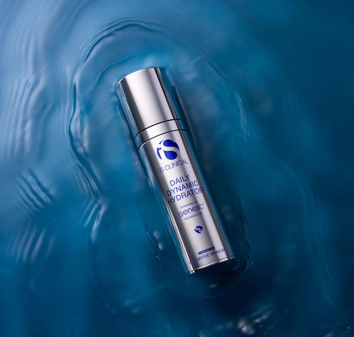 Cosmetic bottle on a blue water background