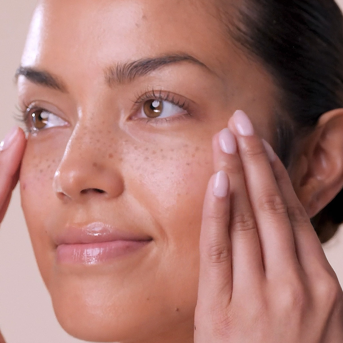 Model close-up from the Eminence Vitamin C+ Serum campaign.