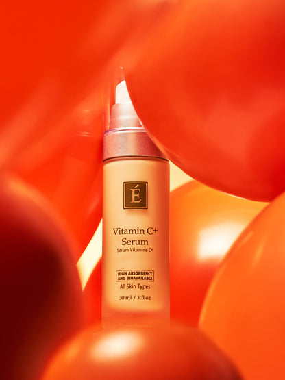 Eminence Vitamin C+ Serum styled in a lifestyle setting.