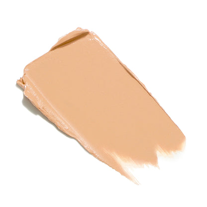 Beige makeup swatch on a white background