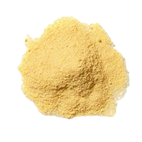 Yellow powder on a white background