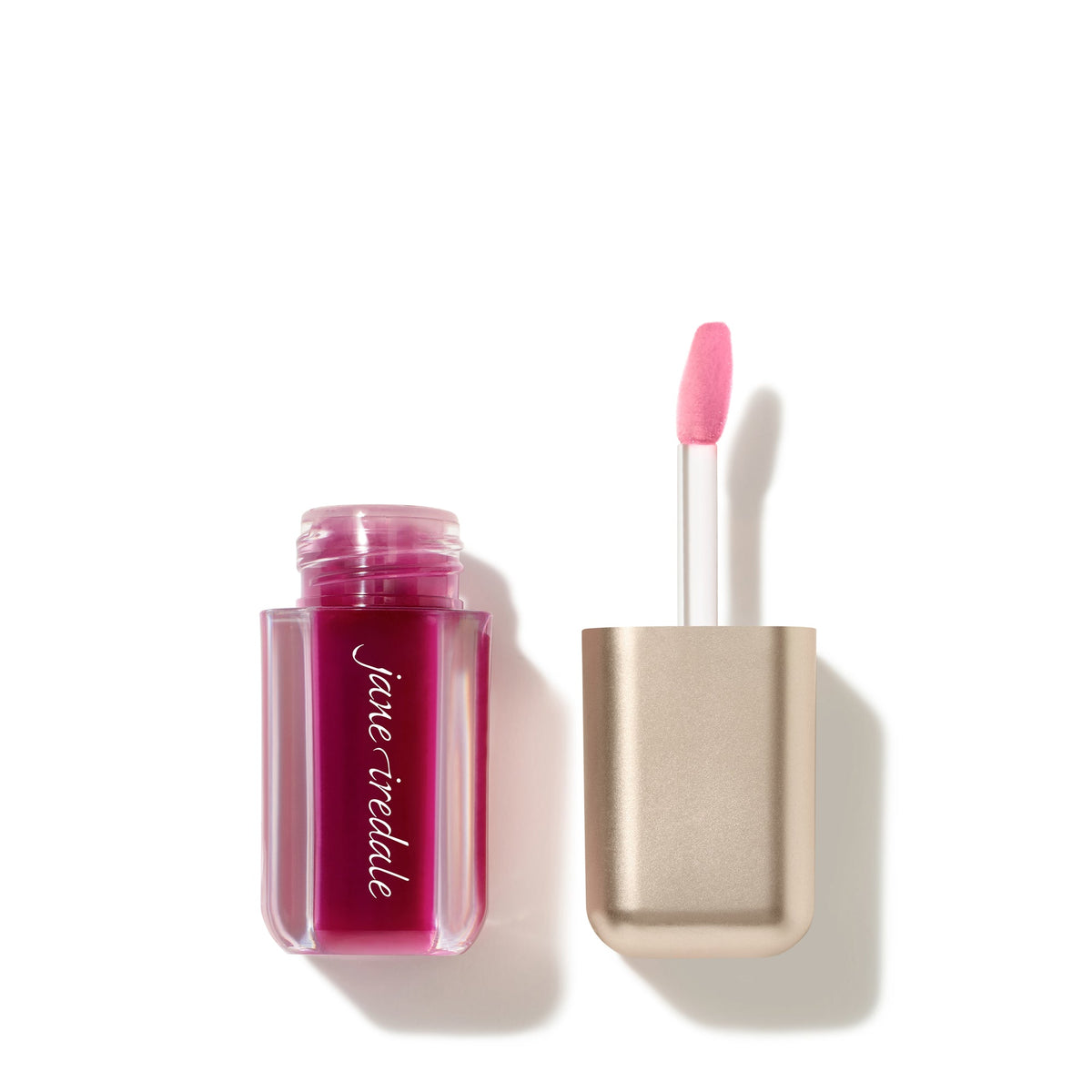 Jane Iredale Just Kissed pH Lip Oil in Blooming Berry, uncapped with the applicator beside it.