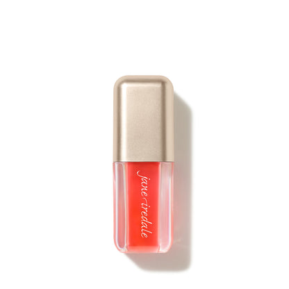 Jane Iredale Just Kissed pH Lip Oil in Blooming Peach, capped, with its gold top.