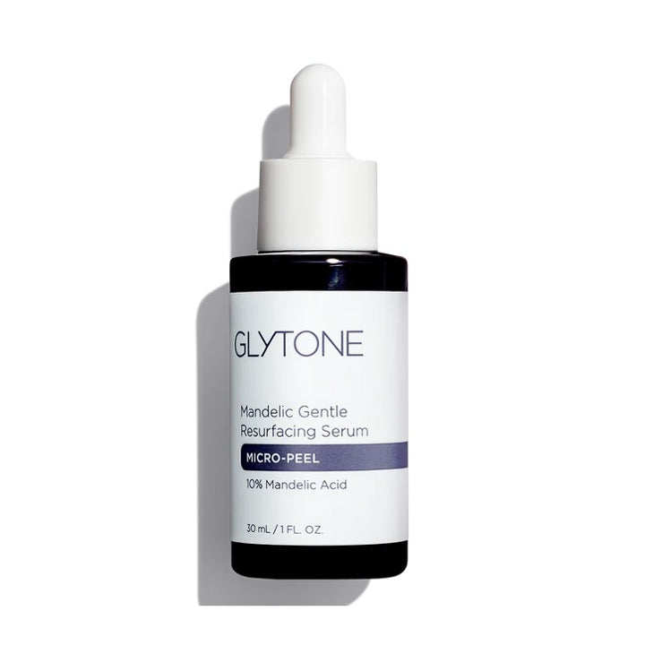 Glytone serum bottle on a white background