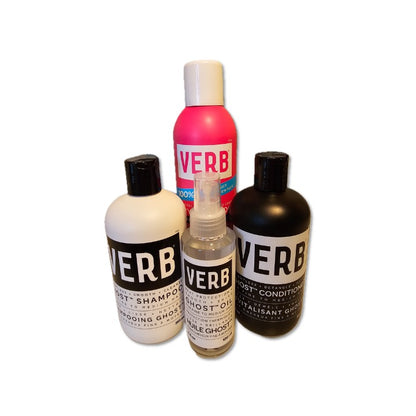 Set of Verb hair care products including shampoo, conditioner, oil, and spray on a white background